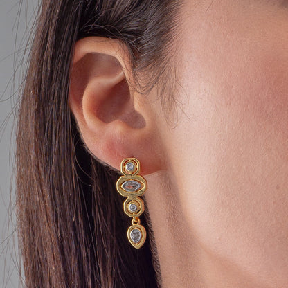 Quatro Stones dangling huggie